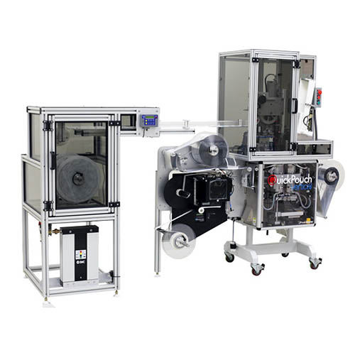 QuickPouch Vertical (first generation) with modular magazine loader, desiccant loader, and label applicator